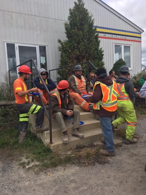 Beam Excavating team having a barbeque